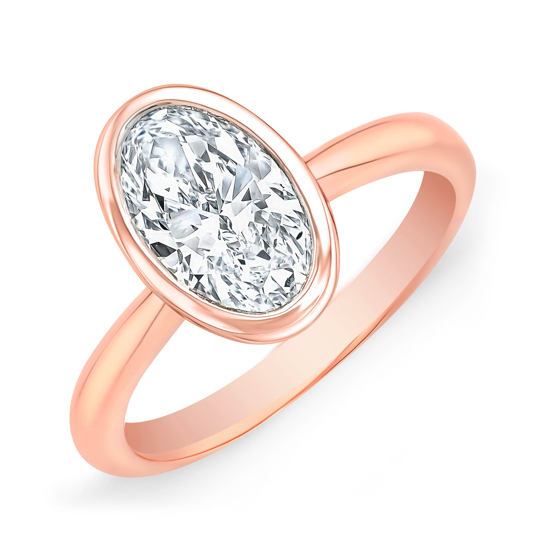 Oval Cut Bezel Set Diamond solitaire ring in rose gold