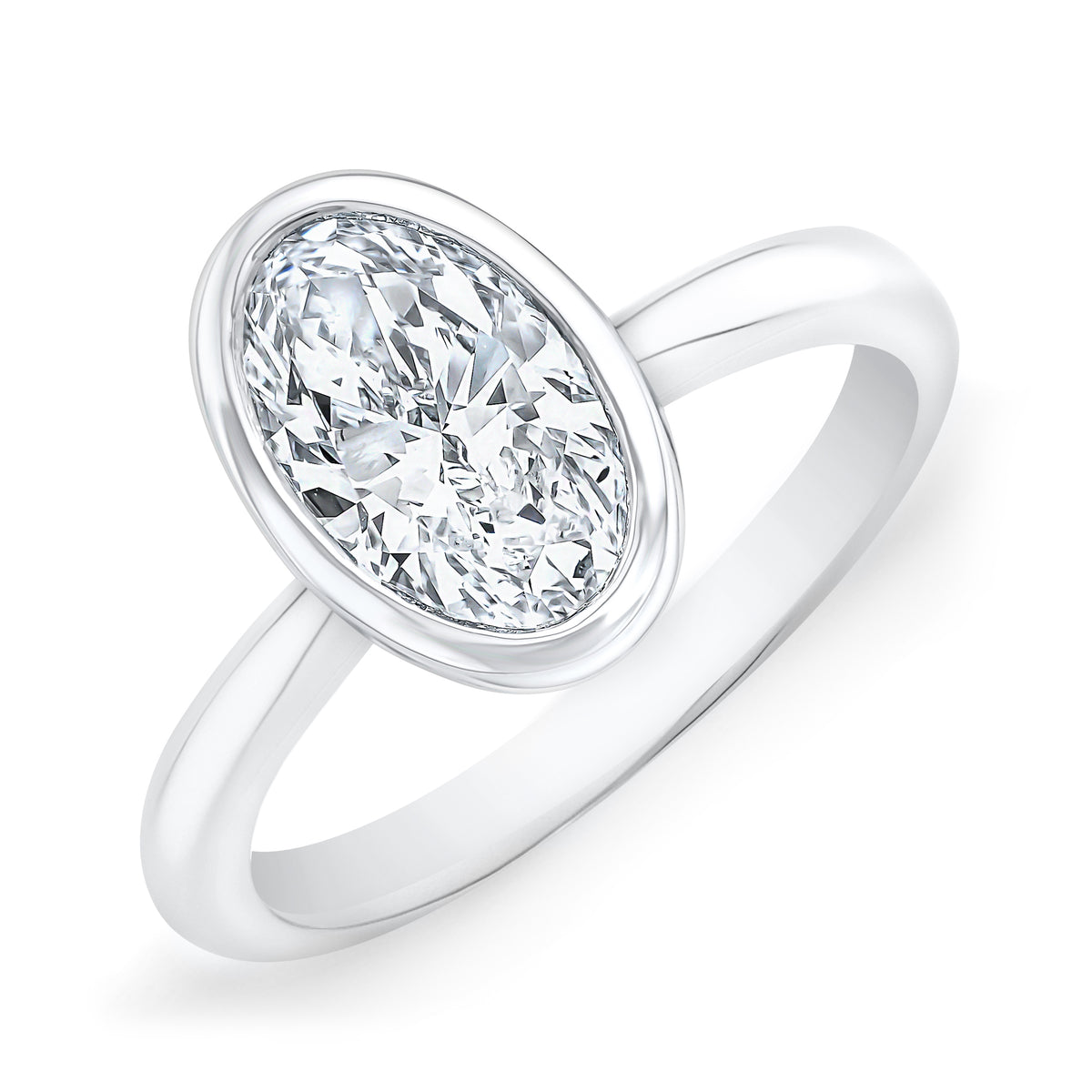 Oval cut bezel set diamond solitaire ring in white gold