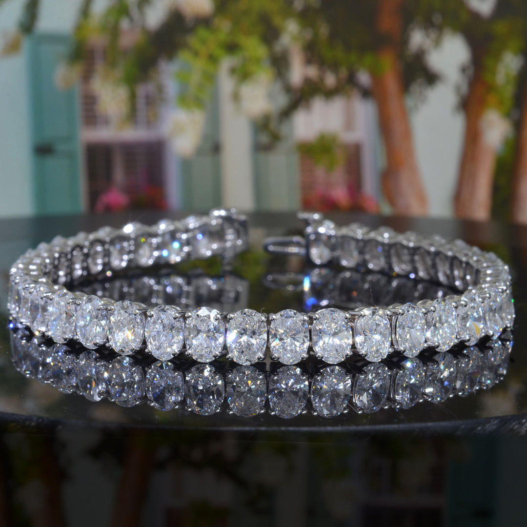 oval shape Diamond white gold bracelet tree background