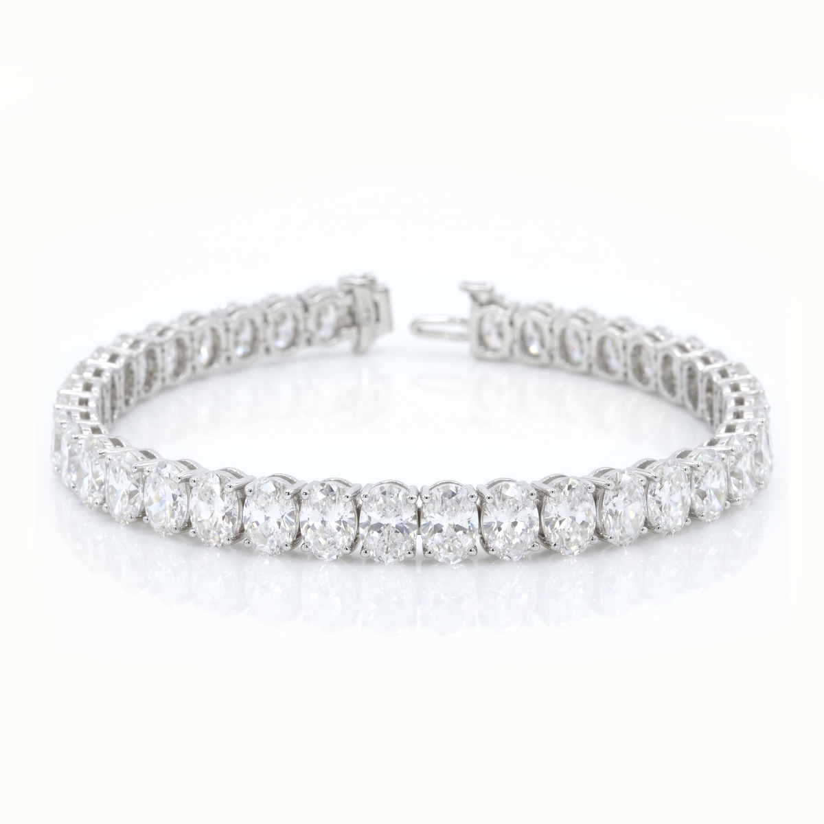 Oval shape diamond white gold bracelet on a white background