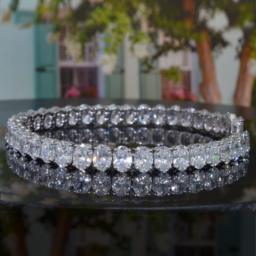 oval shape Diamond white gold bracelet  with a tree background