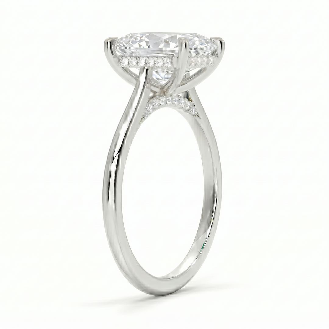 Pear cut center hidden halo diamond ring in yellow white side profile