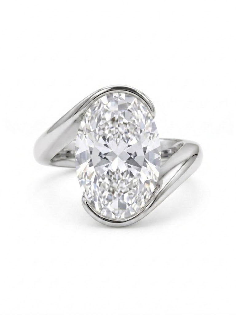Oval cut diamond center Bypass ring in white gold