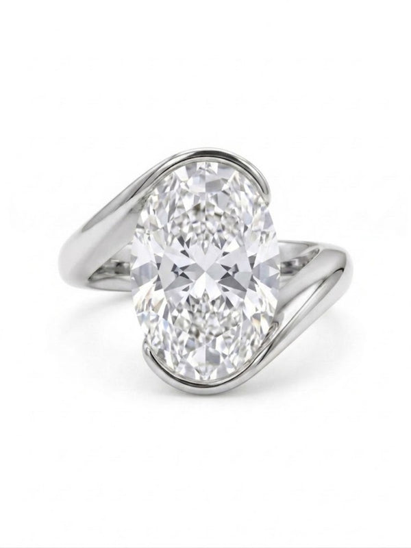 Oval cut diamond center Bypass ring in white gold