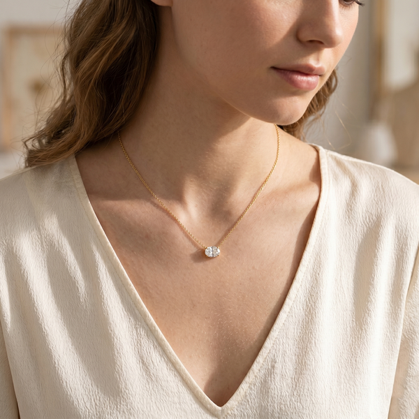 Oval cut East West Pendant Necklace in yellow gold on lady model