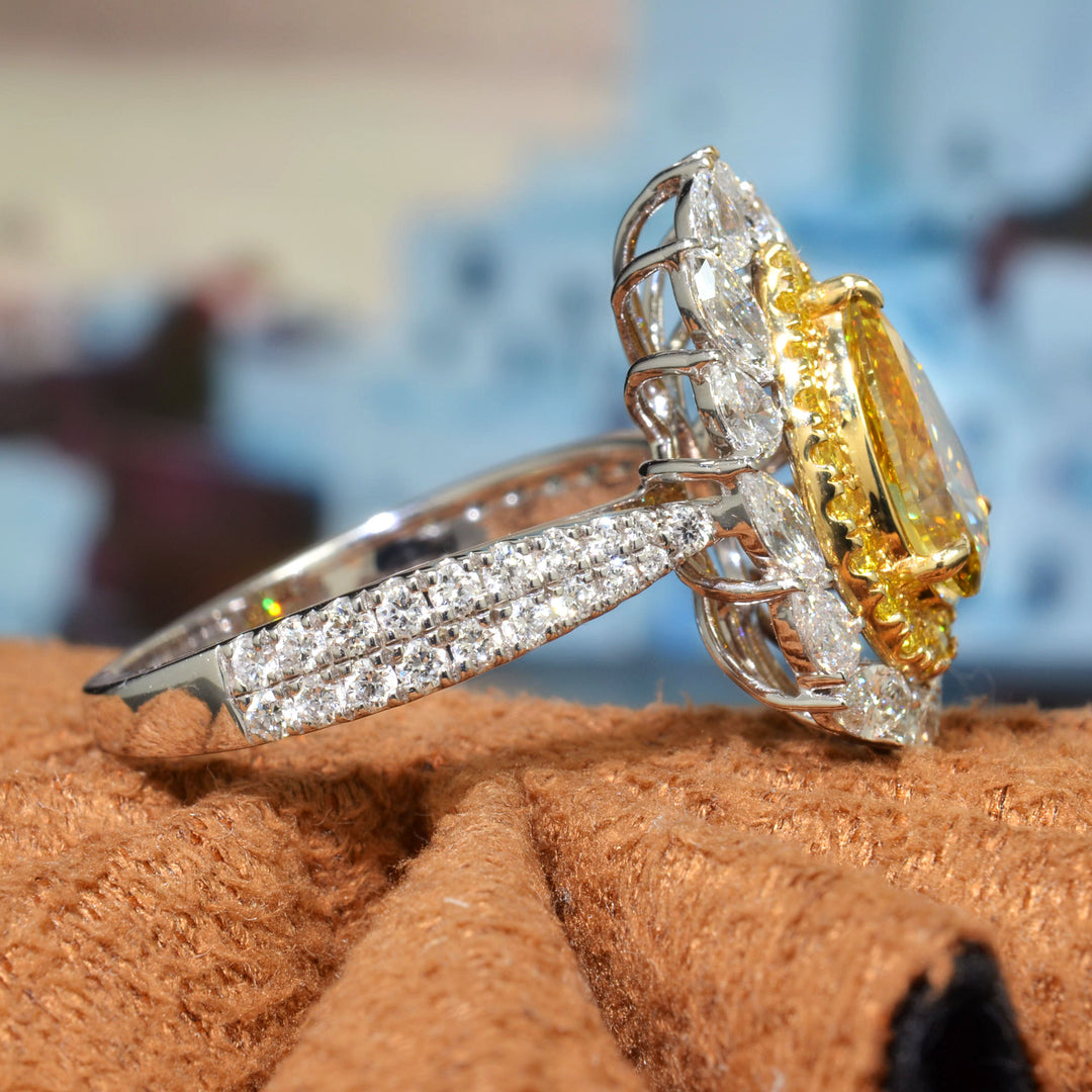 Pear Cut Yellow Diamond center with Double Halo of Marquise and Pear & Yellow Round cut with 2 row shank Diamond Ring side view