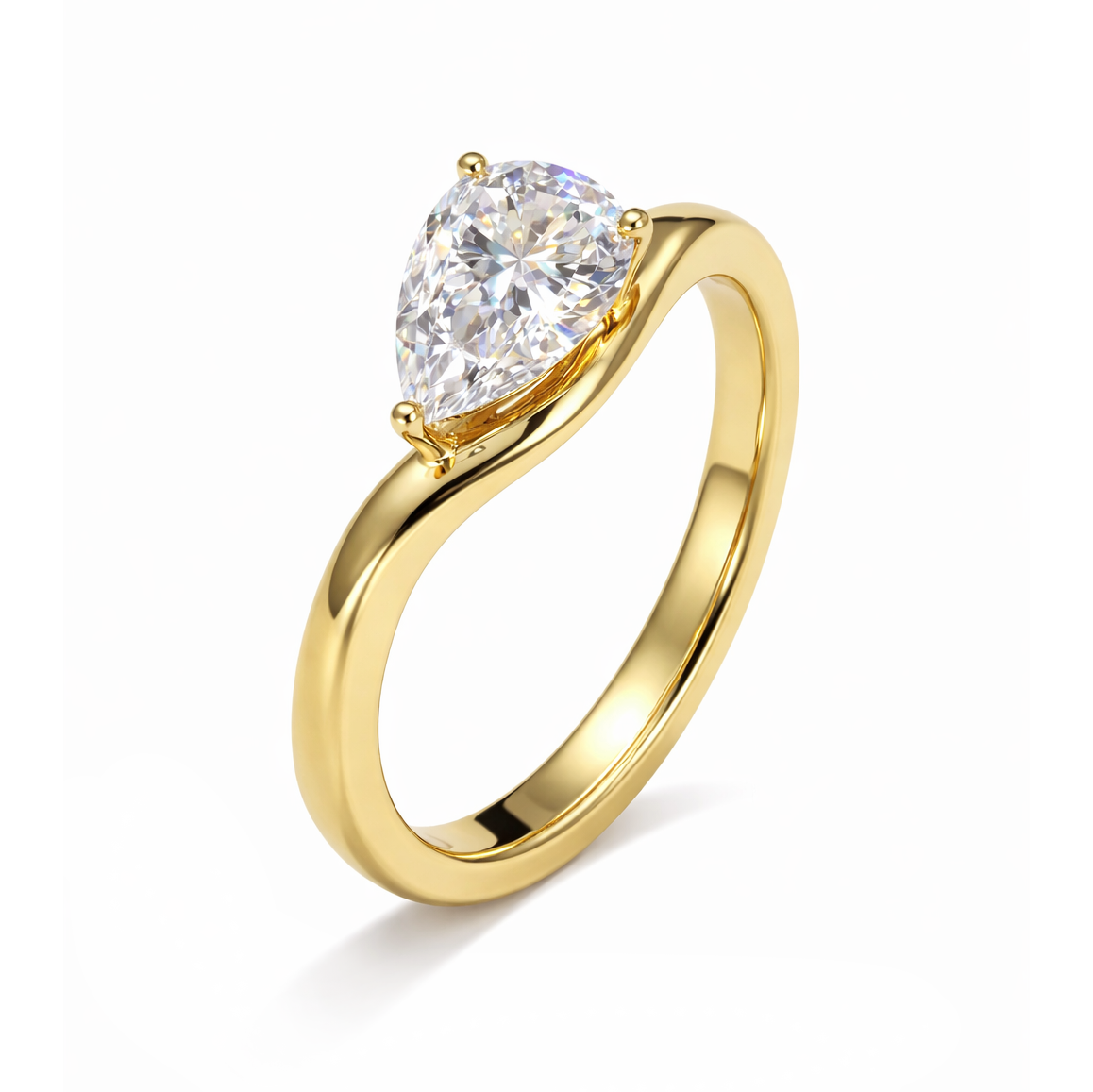 Pear cut east west solitaire engagement ring in yellow gold
