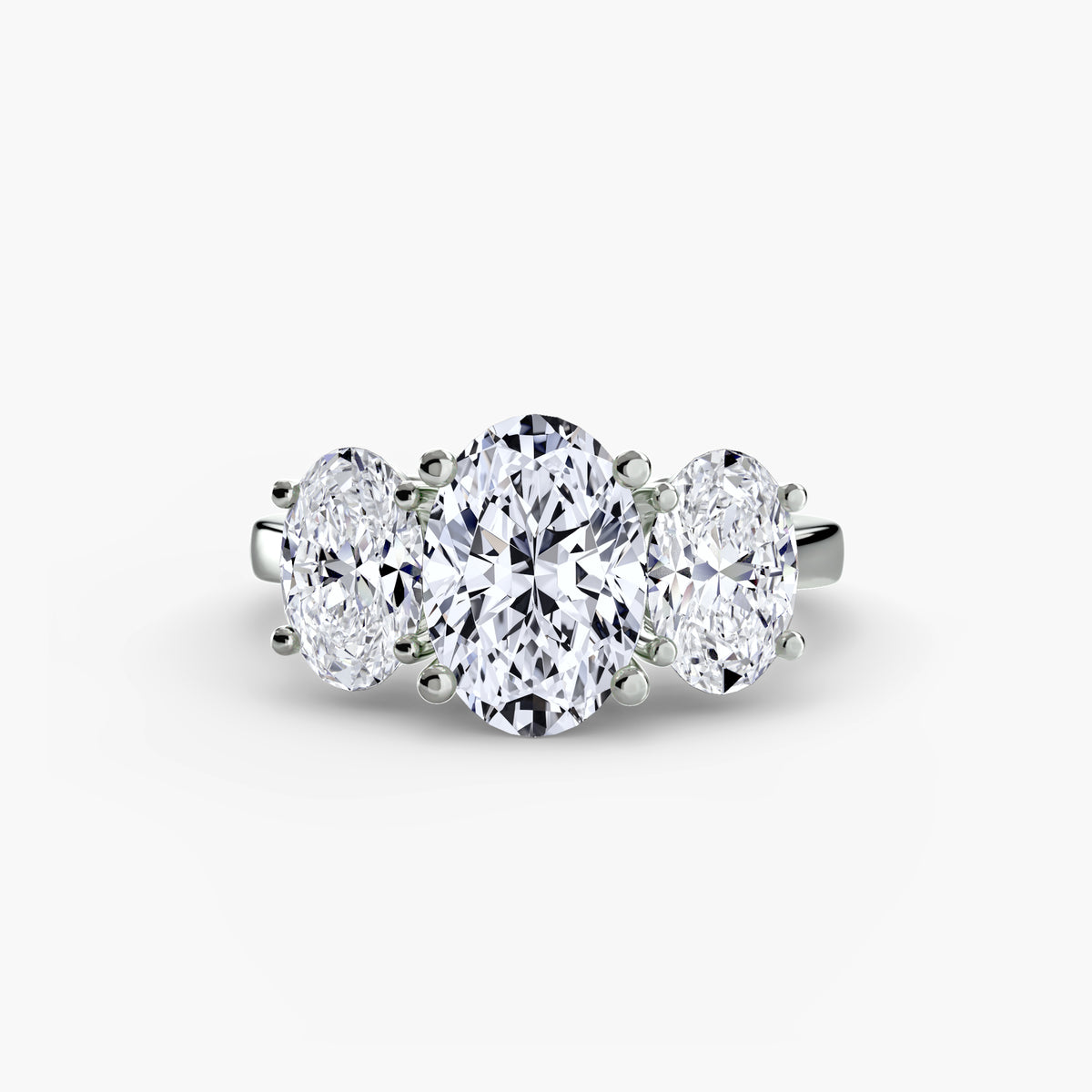 Trilogy oval cut three stone diamond ring