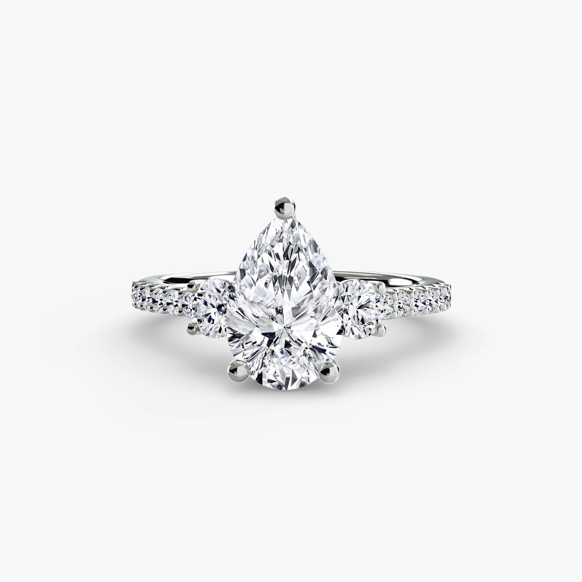Three stone pavé diamond engagement ring