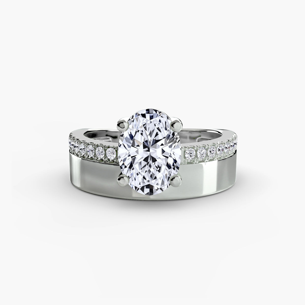 Wide band solitaire with pavé band