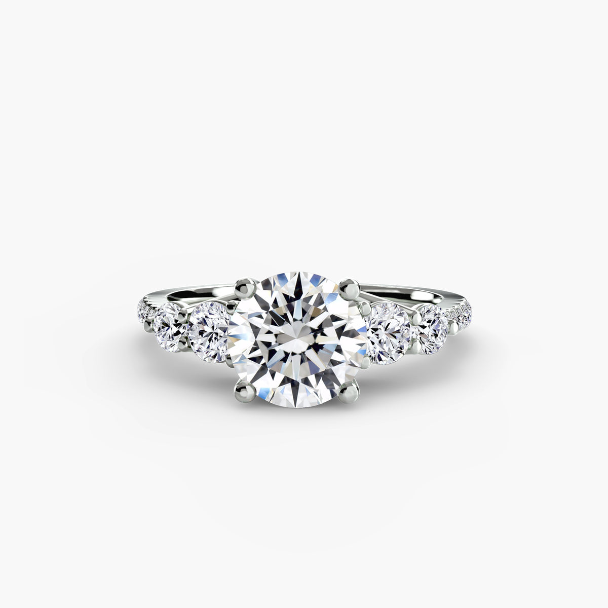 Five stone ring with pavé band