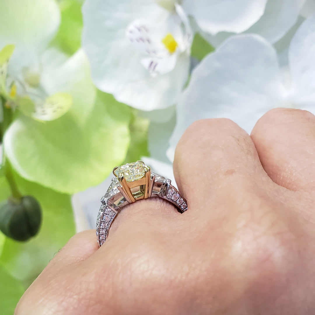 Square Yellow Radiant Cut Diamond Ring & Trillions Diamond Ring on Hand Profile View