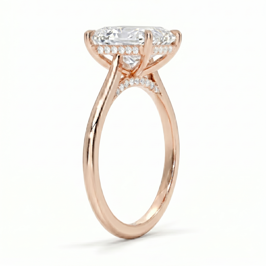 Radiant cut center diamond hidden halo ring in rose gold side profile