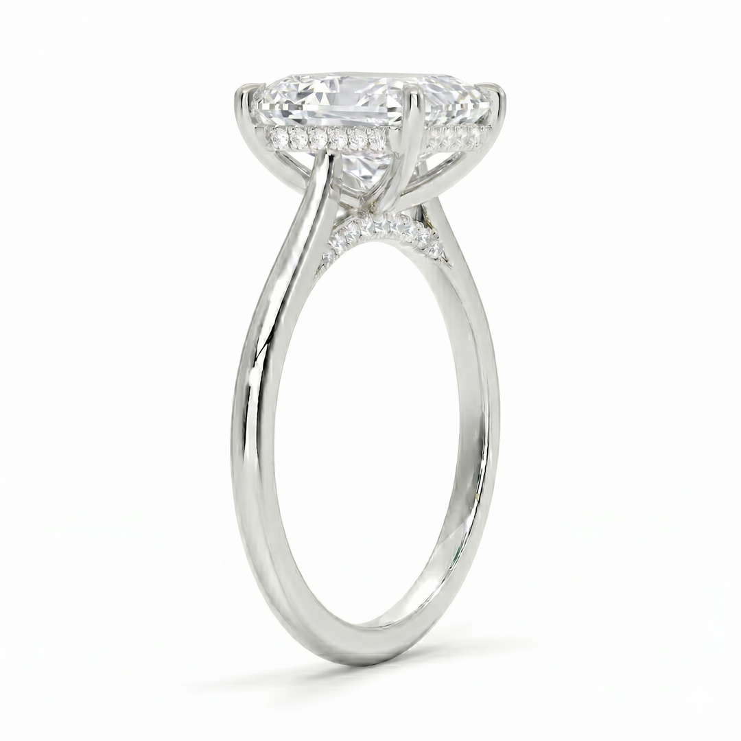 Radiant cut center diamond hidden halo ring in white gold side profile