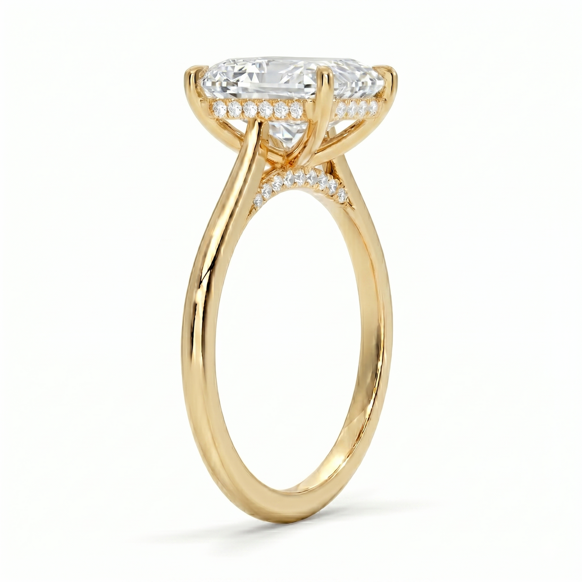 Radiant cut center diamond hidden halo ring in yellow gold 