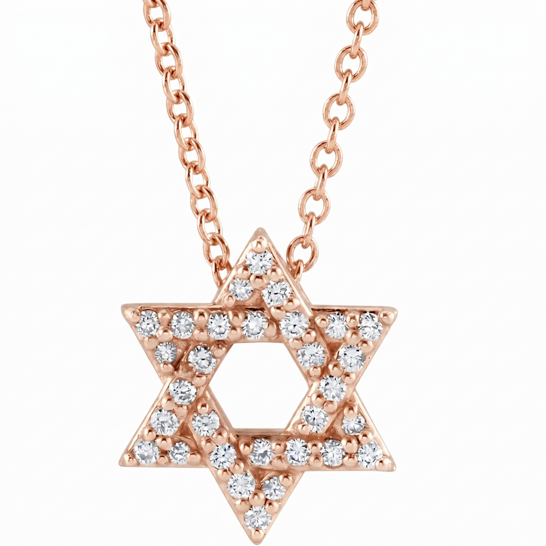 Rose gold Star of David necklace with diamonds on a white background