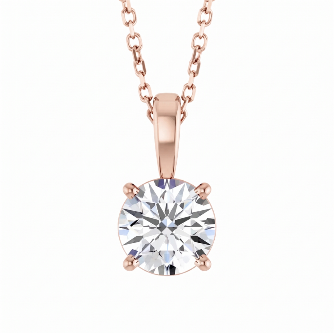 Round cut solitaire diamond pendant with chain in rose gold front view