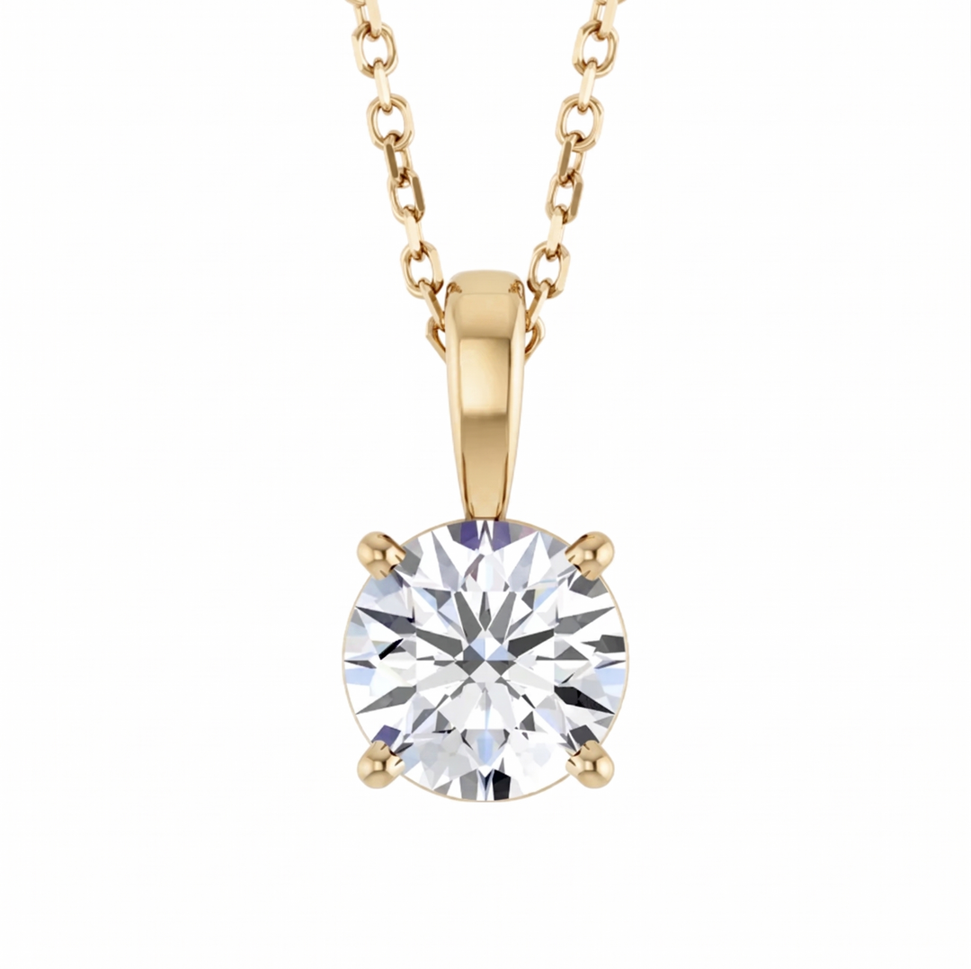 Round cut solitaire diamond pendant with chain in yellow gold front view