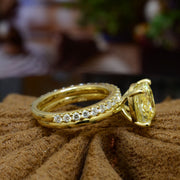 Fancy Yellow Cushion cut yellow gold ring front bridal set with matching band-side