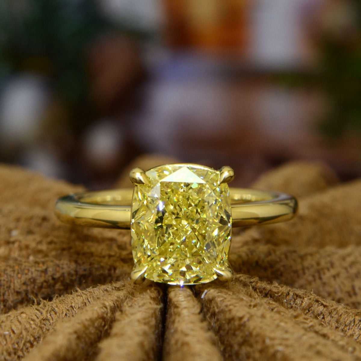 Fancy yellow cushion cut yellow gold ring front