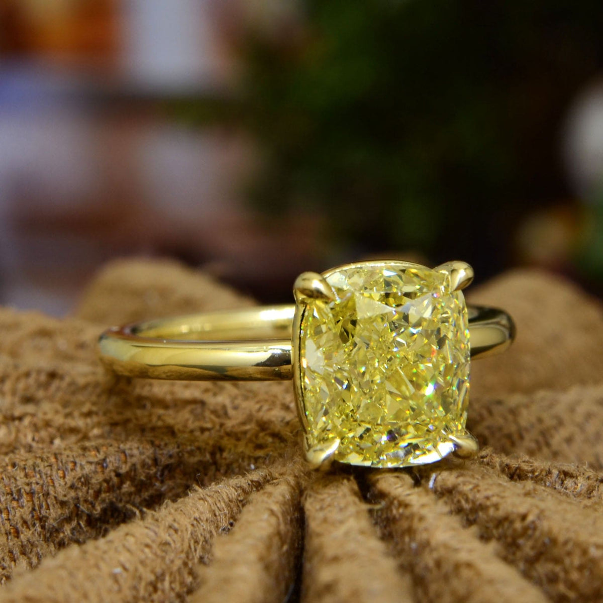 Fancy yellow cushion cut yellow gold ring front side