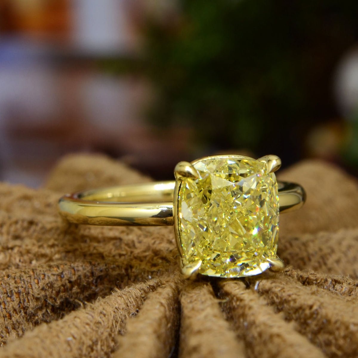 Fancy yellow cushion cut yellow gold ring front side