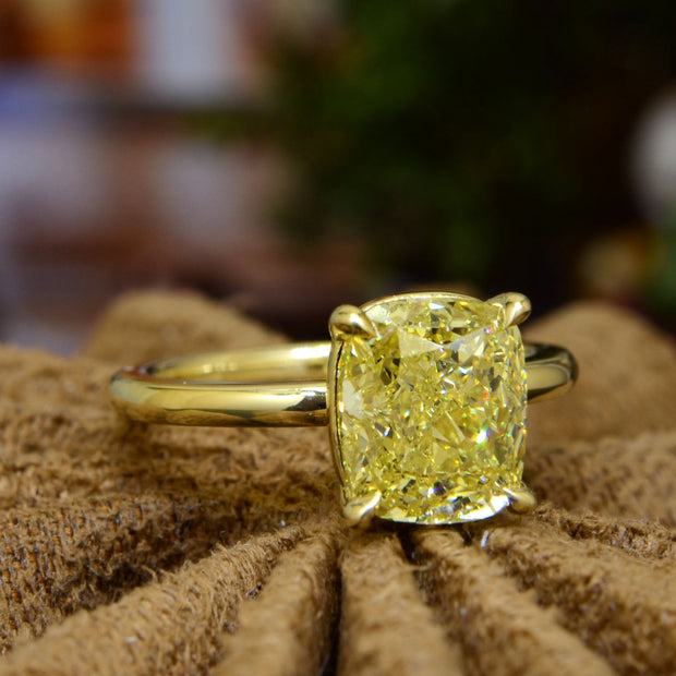 Fancy Yellow Cushion cut yellow gold ring front-side