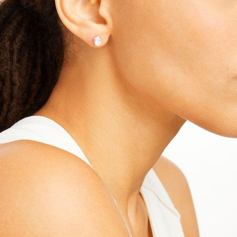 Lab Grown Oval Stud Earrings on Ear