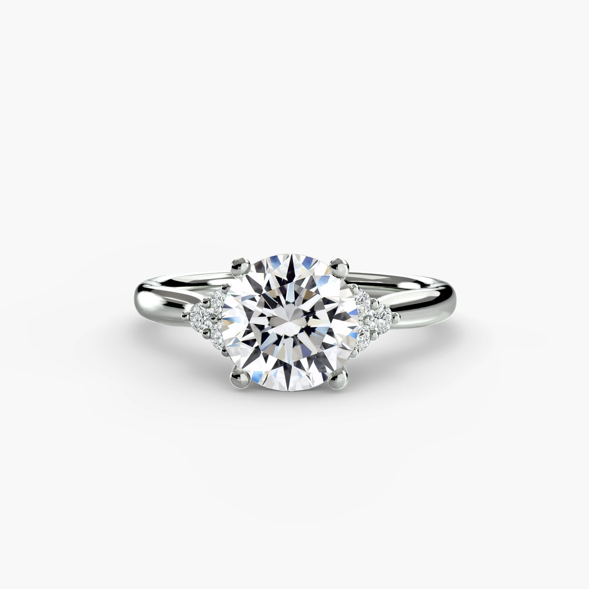 Solitaire with cluster shoulders