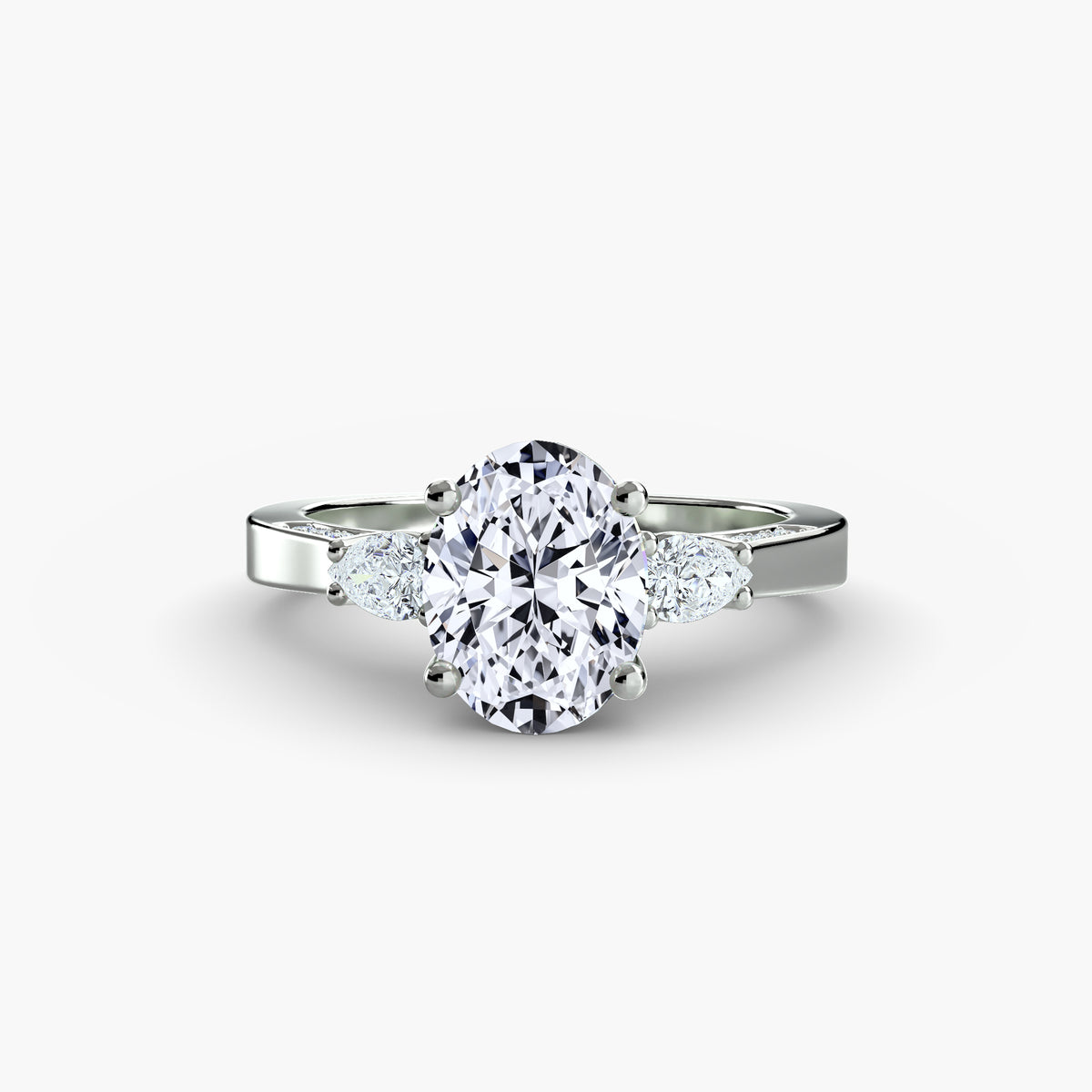 Three stone with pavé shoulders