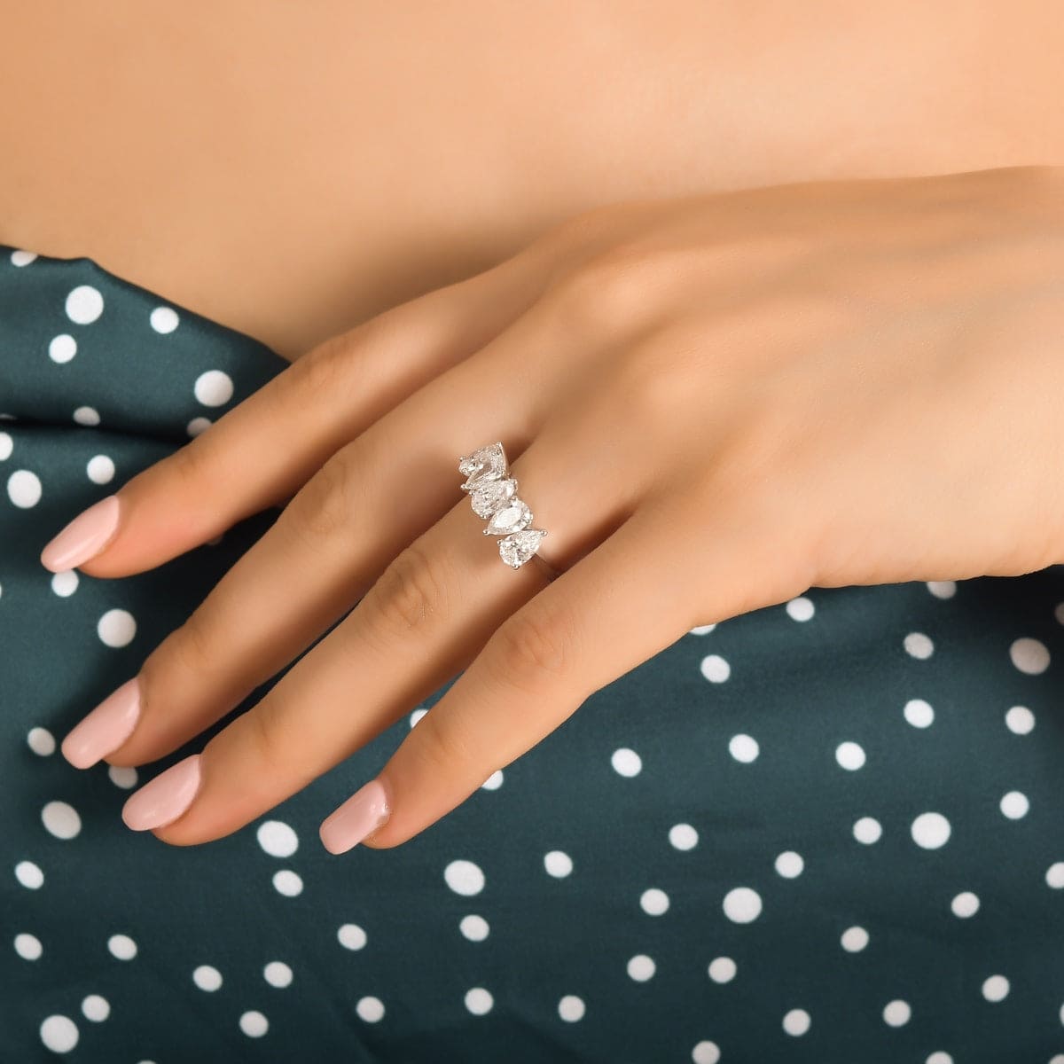 5 stone diamond ring on hand