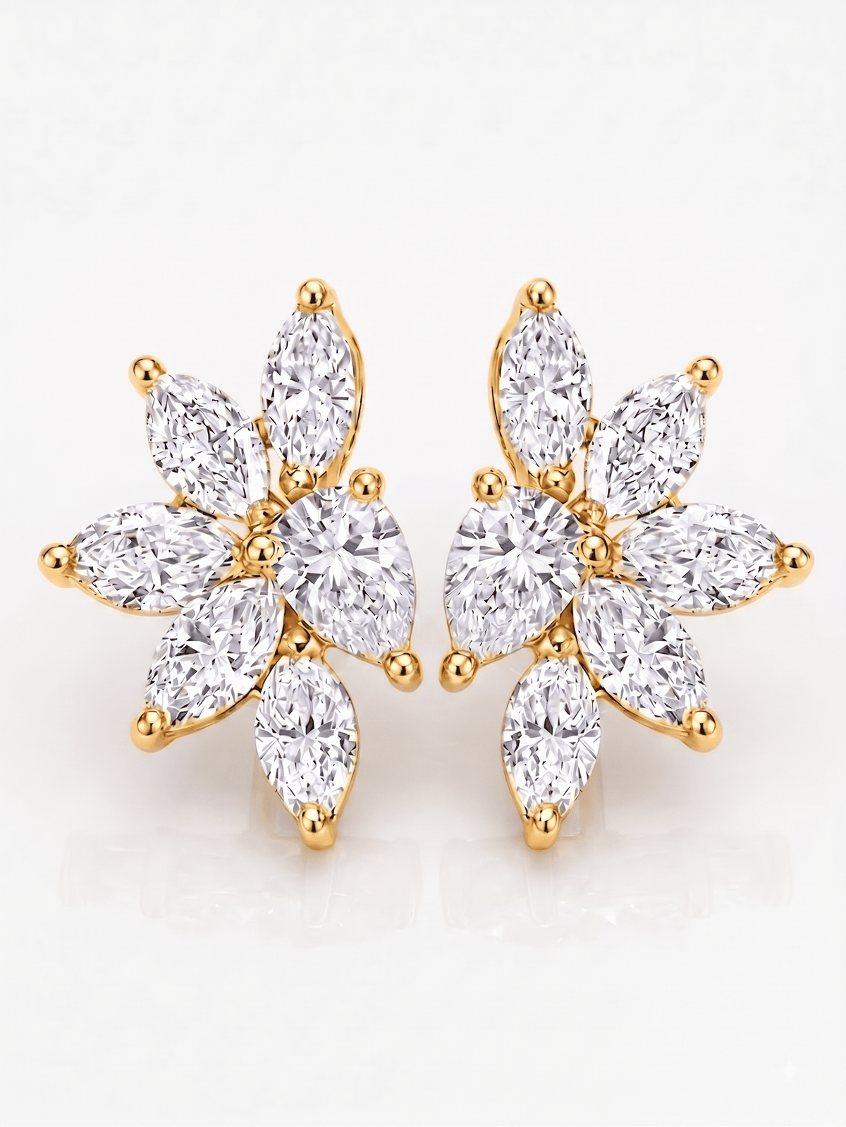 Cluster marquise & pear cut stud earrings in yellow gold front view