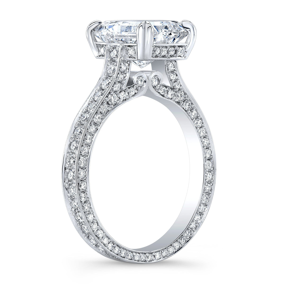 Elongated radiant cut pave hidden halo ring side profile

