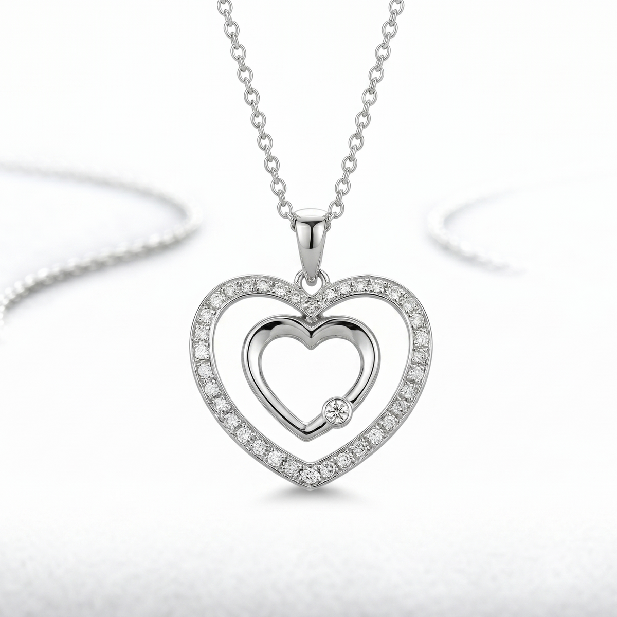 Double_heart_pendant_loop_chain_white_background