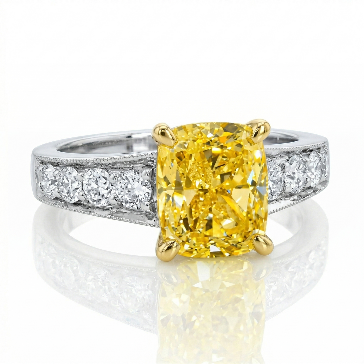 Elongated canary cushion cut diamond ring 