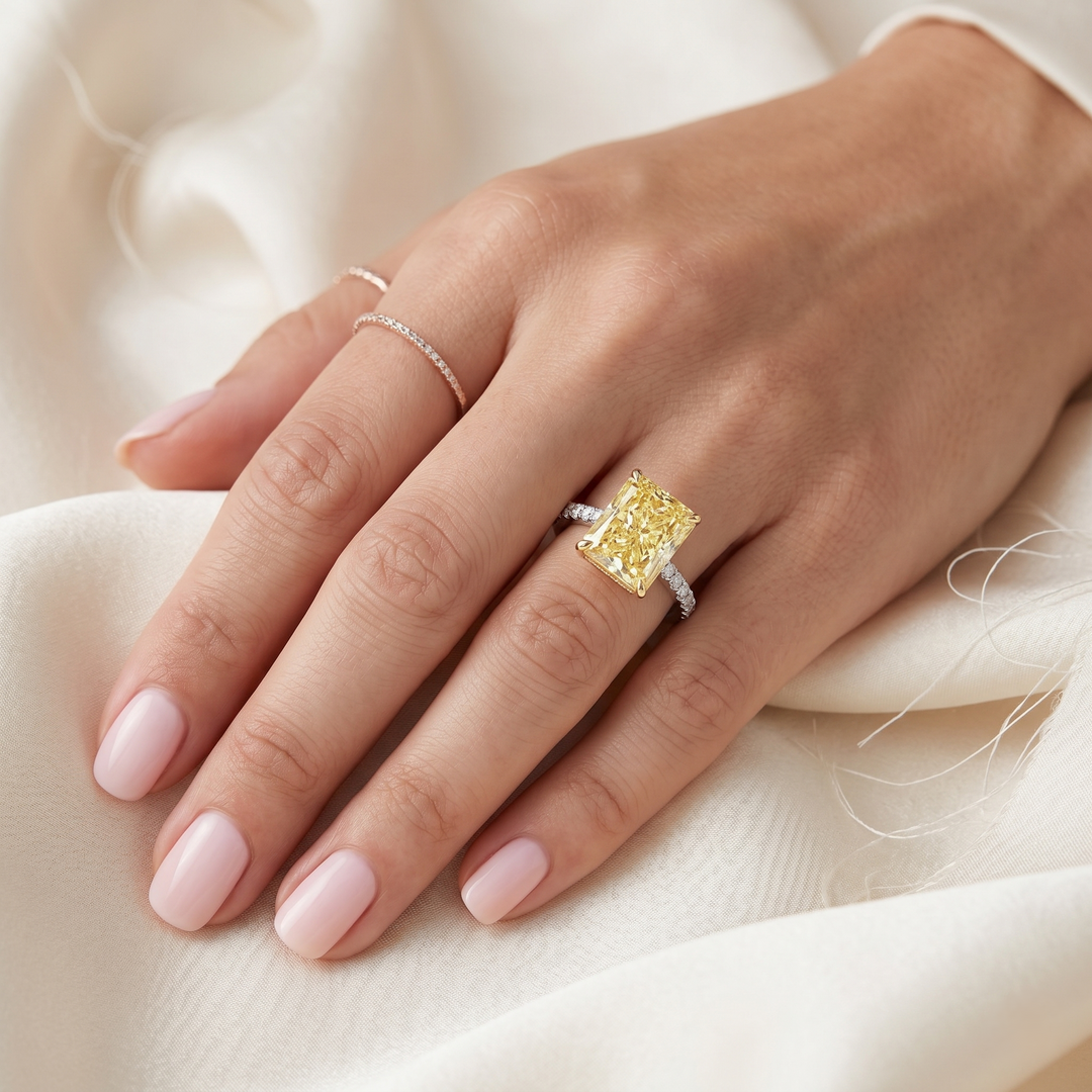 elongated hidden halo Yellow radiant on finger