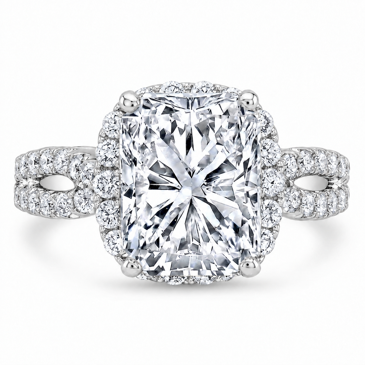 Elongated_radiant_with_cushion_halo_split_shank_white_gold