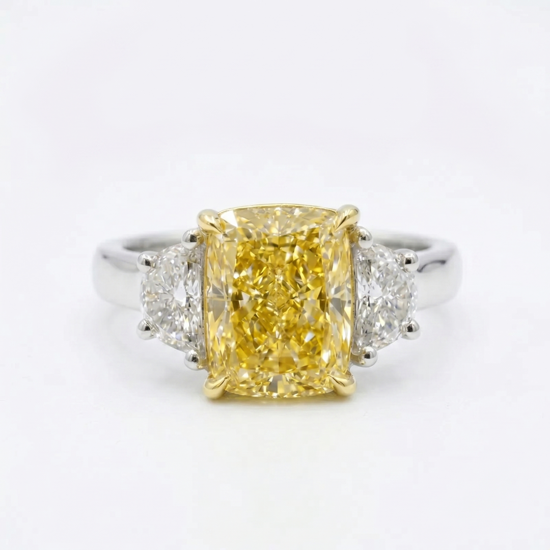 elongated yellow cushion with halfmoon 3-stone ring in white gold