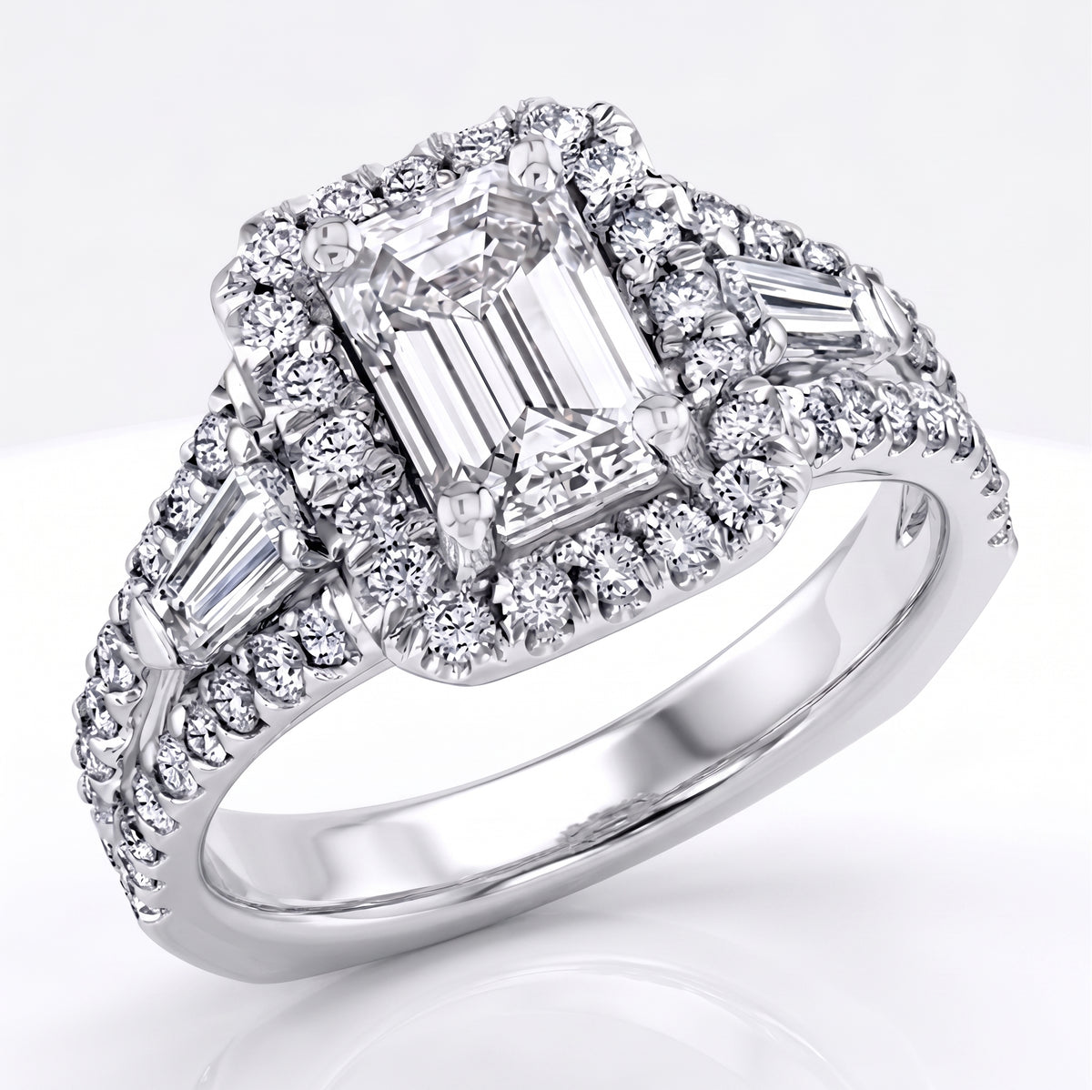 Halo_emerald_cut_with_baguette_on_the_sides_white_gold