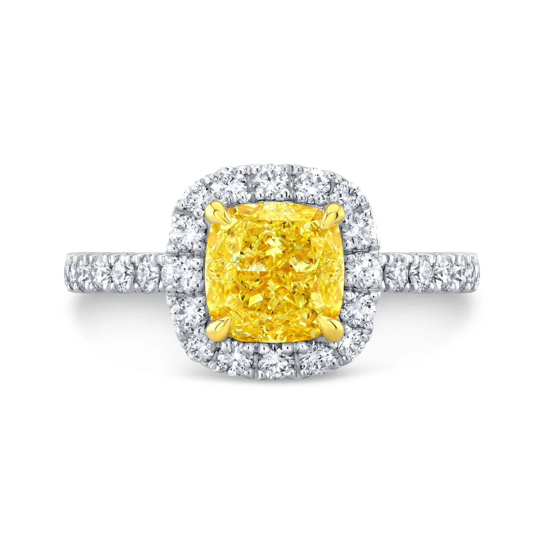 Yellow cushion cut halo diamond ring in white gold with yellow gold prongs