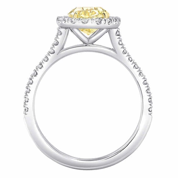 Lab grown yellow oval cut halo diamond ring vvs2 igi certified
