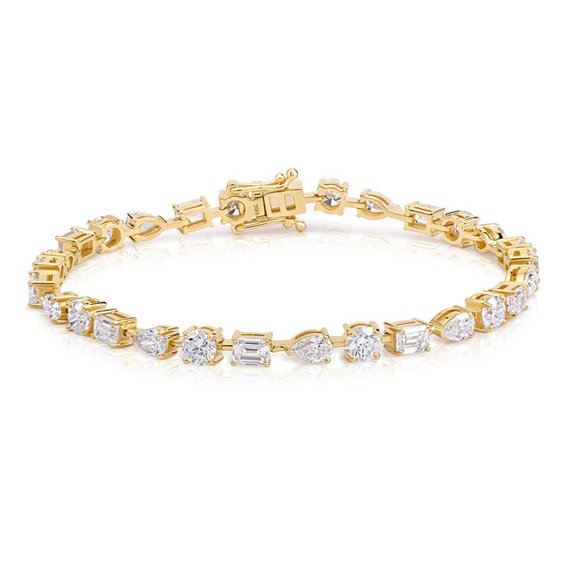 Mixed Shape Emerald, Pear and Round Diamond Tennis Bracelet in yellow gold