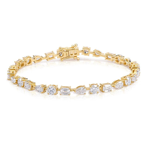 Mixed Shape Emerald, Pear and Round Diamond Tennis Bracelet in yellow gold