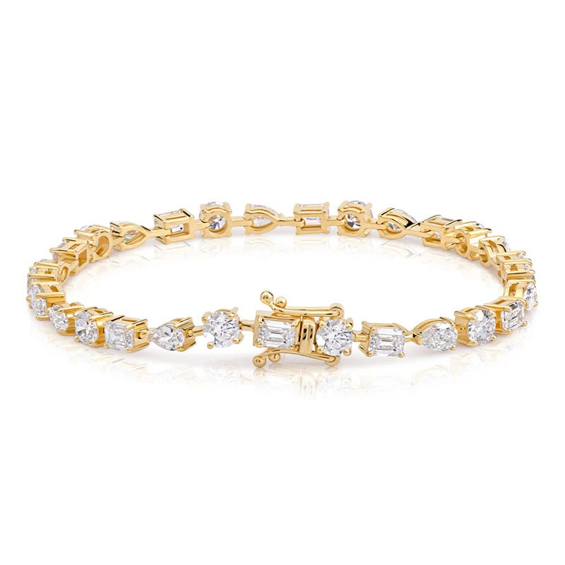 Mixed Shape Emerald, Pear and Round Diamond Tennis Bracelet in yellow gold showing lock