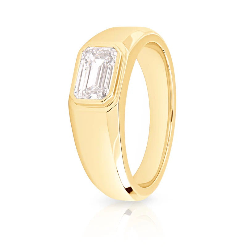 Emerald cut solitaire bezel set diamond men's band east west orientation  in yellow gold