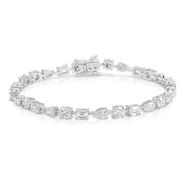Mixed Shape Emerald, Pear and Round Diamond Tennis Bracelet in white gold
