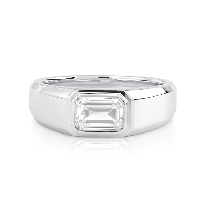 Emerald cut solitaire bezel set diamond men's band East-West orientation in white gold