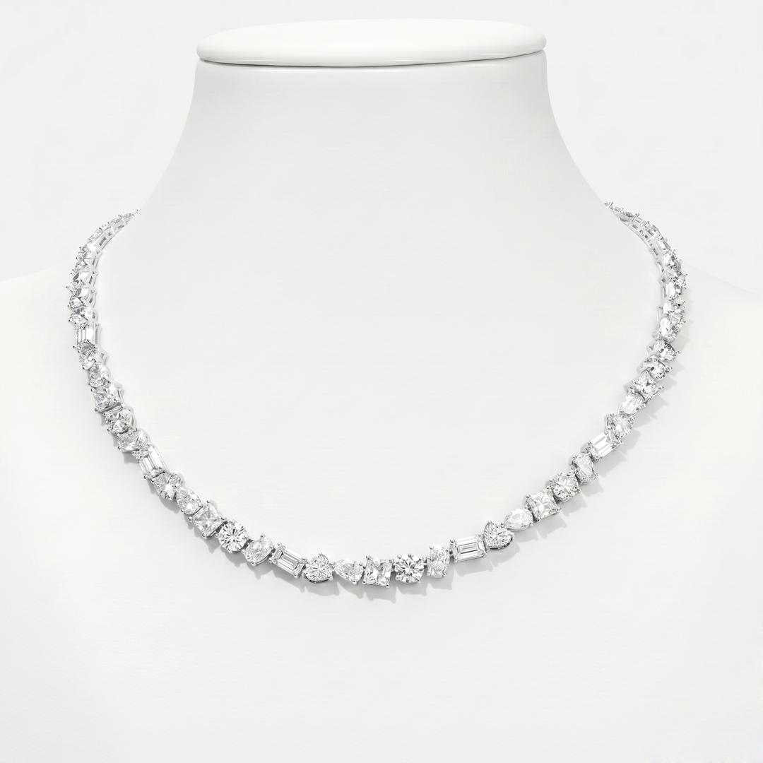 mix shape tennis necklace round oval emerald heart pear princess cut in white background