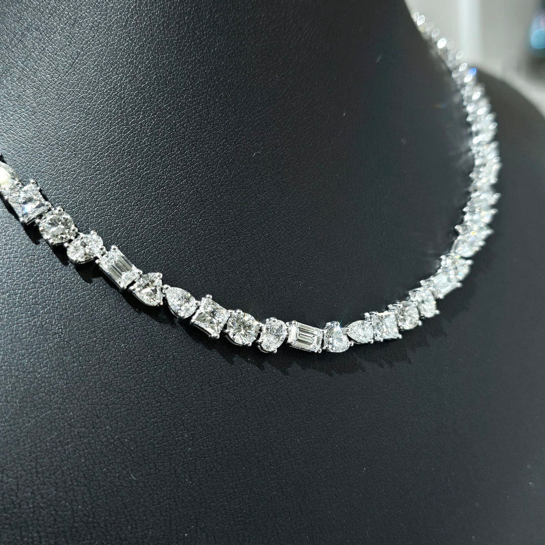 mix shape tennis necklace round oval emerald heart pear princess cut side view angle view
