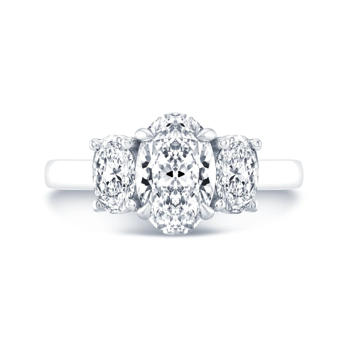 Oval cut 3 stone diamond ring in white gold
